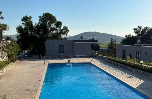 Milas Apartment | Scenic Flat with Shared Pool in Milas