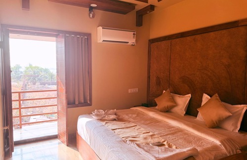 Hosdurg Resort | Sea island resort near Pulimut beach with AC and balcony.