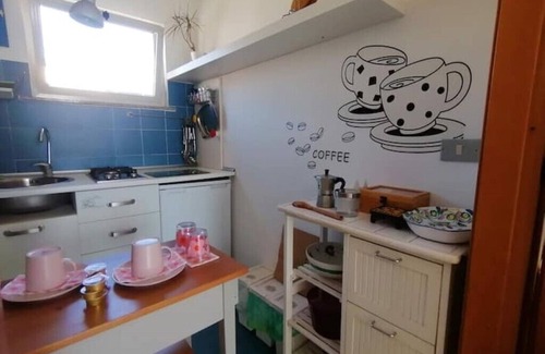 Roccalumera Apartment | Seafront, attic room with terrace.