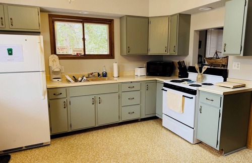 Tomahawk Cottage | Secluded Lakefront Cabin with Private Deck, Lake Views & Firepit - Dog-Friendly