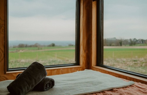 Cheshire West and Chester Cabin | Secluded Woodland Romantic Off-Grid Cabin With Firepit