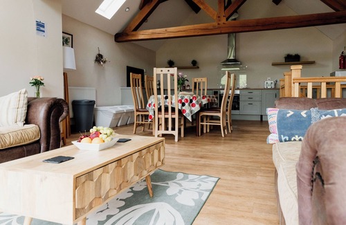 Devils Bridge House | Section of luxury renovated barn with a large hot tub. Sleeping 5