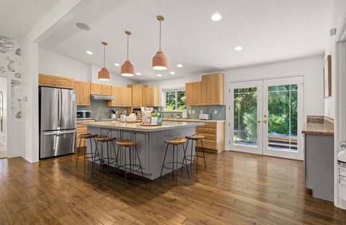 Husum House | Serene location, lawn games, private creek access, partial Mt. Adams view!