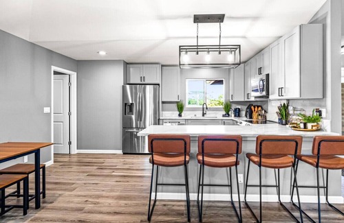 Keaau House | Serene Sky Blue Lounge: Unwind in Comfort & Style