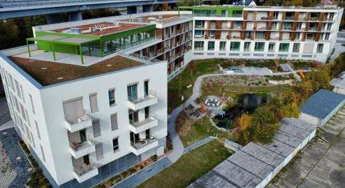 Banska Bystrica Apartment | Simcity IX l Central park with Air Conditioning, free garage parking, balcony and 24 7 self check-in