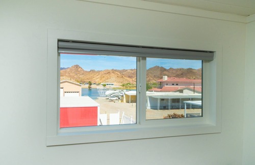 Parker Strip House | Skibatical, Private Fenced Yard at Roadrunner Resort