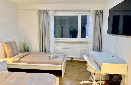 Nussbaumen Apartment | Skyline Retreat Jedes Zimmer mit TV