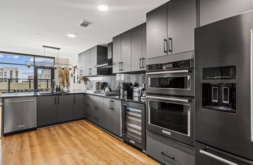 Peachtree Center House | Skyline Townhouse: 3BR Penthouse in Atlanta, GA | City View, Gym, Pool & Terrace