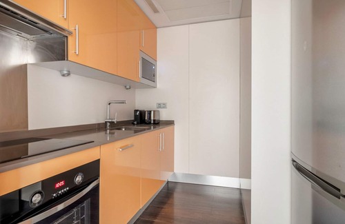 Malasana Apartment | Sleek Argüelles 2BR w/Gym & Pool, nr Madrid Rio, by Blueground