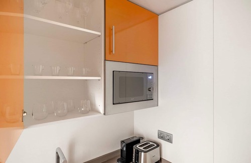 Malasana Apartment | Sleek Argüelles 2BR w/Gym & Pool, nr Madrid Rio, by Blueground