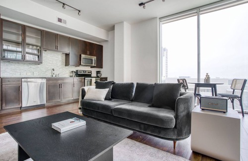 Waller Creek District Apartment | Sleek Downtown 1BR w/Gym, Deck & W/D, walk to 6th St bars, by Blueground