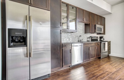 Waller Creek District Apartment | Sleek Downtown 1BR w/Gym, Deck & W/D, walk to 6th St bars, by Blueground