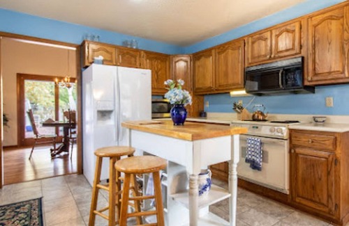 Lawrence House | Sleeps 12! Main Level Primary Suite - Beautiful Backyard Oasis!