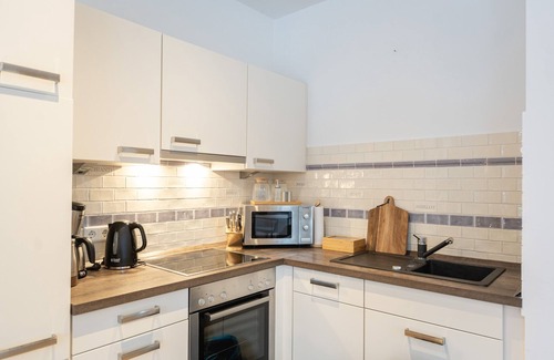 Bad Zwischenahn Apartment | SmartFewo: Lichtermeer | lake terrace | sauna