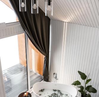 Madona Villa | Sniegi design cabin with sauna