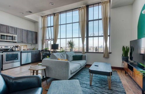 West Poplar Apartment | Sosuite | 1BR Penthouse w W/D, Gym, On-Site Bar