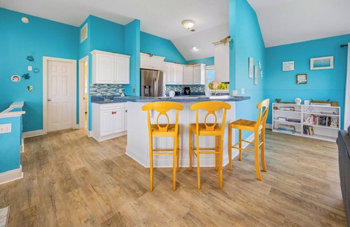 Wind Over Waves House | Soundside Dog Friendly Home with Pool, Hot Tub, Cmty Boat Ramp, and Game Room