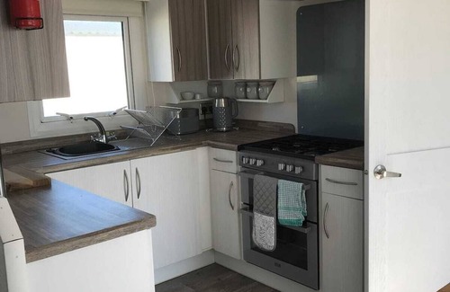 Camber House | SP77 8 Berth Caravan with Veranda - pets allowed