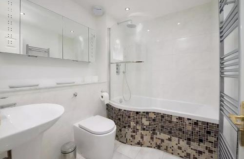 Swiss Cottage House | Spacious 2-bedroom Townhouse with Garden & Patio