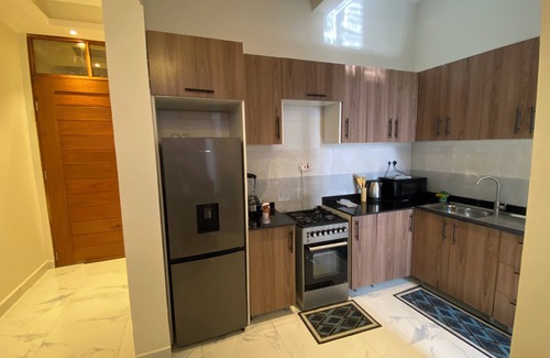 Mikocheni Apartment | Spacious 3-bedroom apartment with AC, WiFi in beautiful Dar es Salaam