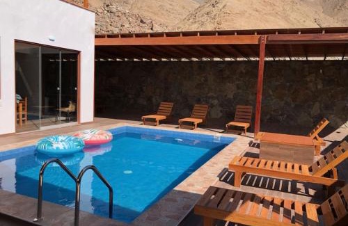 Calango House | Spacious 3-bedroom and 2 bathroom home with private pool and patio and free Wi-Fi