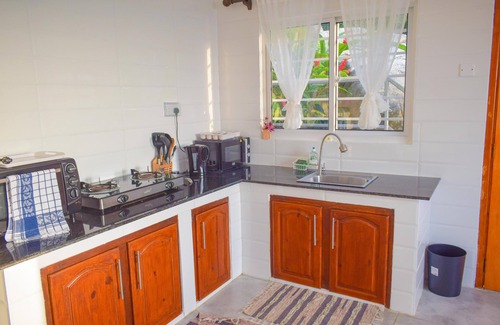 Beau Vallon Apartment | Spacious 4-bedroom apartment with beautiful view at Beau Vallon with Wi-Fi/AC