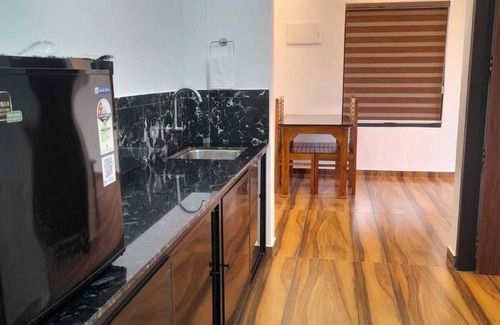 Manjoora Apartment | Spacious 4BHK in Wayanad with WiFi, AC, gym & modern amenities