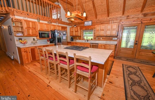 Crellin Cabin | Spacious 6BR Log Cabin Retreat with Pool, Hot Tub & Stunning Mountain Views