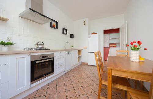Bielany Apartment | Spacious Apartment with Parking by Noclegi Renters