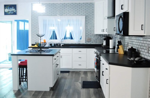 Eau Claire House | Spacious family friendly home with a heated indoor pool