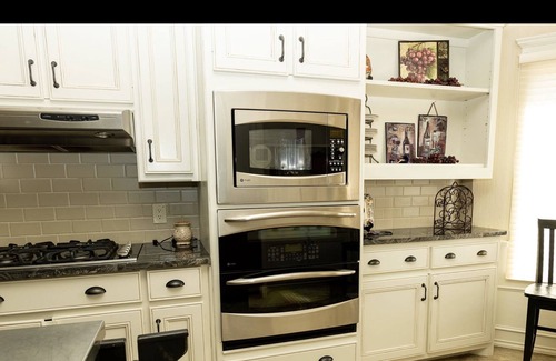 Lubbock House | Spacious home with huge projection screen 8’x12’ in basement. 5 person hot tub.