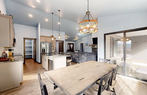 Sturgis House | Spacious mountain view home with gas fireplace, game room & heated 4 car garage