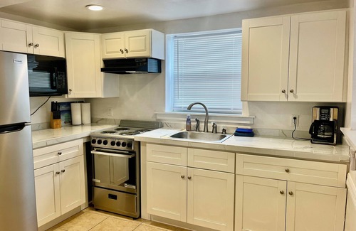 Fort Myers Beach House | Spacious Two King, One Bath, Pool, Tiki Bar, Duplex, One Blk to Times Sq./Beach