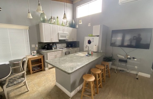 Balboa Island Condo | Spacious upper unit with partial water view four houses from North Bay Front