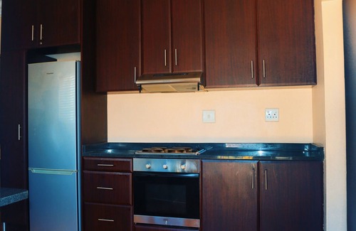 Bluff Villa | Spacious urban home with private pool in the backyard. 5 minutes from the beach.