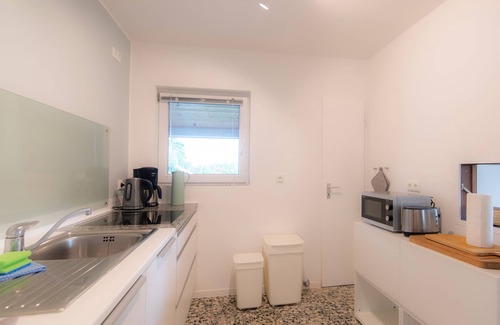 Stinteck Apartment | Spacious vacation apartment with garden, surrounded by greenery.