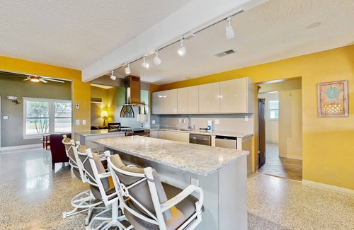 Venetian Way House | Spacious waterfront home with private pool, sunroom and dock.
