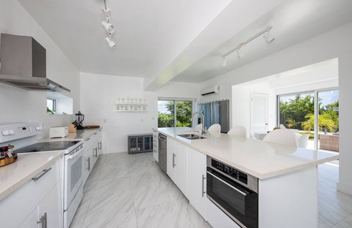 South Palmetto Point House | Spectacular Beachfront Estate on Calm Caribbean Cove; Private Beach, Htd.Pool