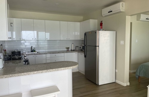 West End Condo | Spectacularly situated beachfront Apple Tide @ The Tides at Little Apple Bay