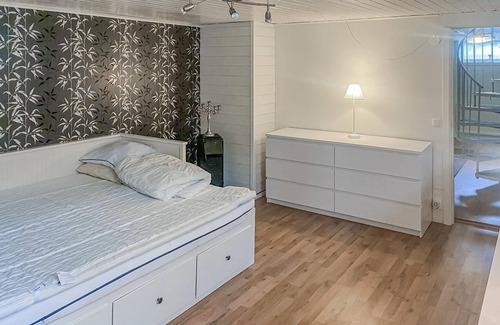 Harryda Municipality House | Spend an unforgettable vacation near the lake in this inviting vacation home.