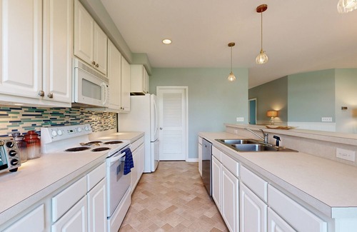 Rehoboth Beach Condo | Spring Lake Condo with patio, free WIFI, W/D, shared pool