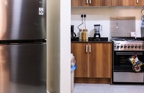 Lubowa Apartment | Stay at Sophie's World- Brand New Cozy 2 BR Apartment with Stunning Night Views