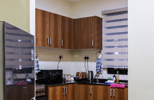 Lubowa Apartment | Stay at Sophie's World- Brand New Cozy 2 BR Apartment with Stunning Night Views