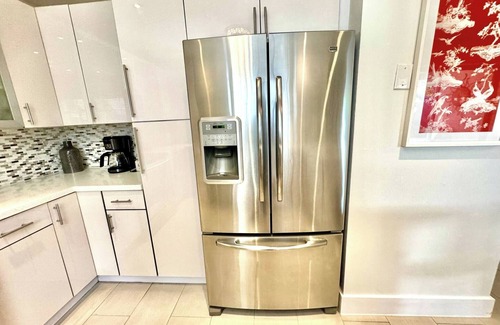 Coral Way House | Stay Central: Relax in Our Heated Pool Oasis