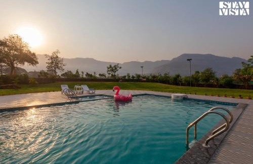 Vaijanath Villa | StayVista's Hillside Meadows - Mountainside Retreat with Farm View, Pool & Deck, Lawn & Gazebo