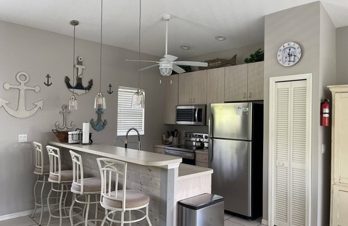 Jose's Hideaway House | Steps from the beach! Spacious island retreat with pool, grill, and space for 12