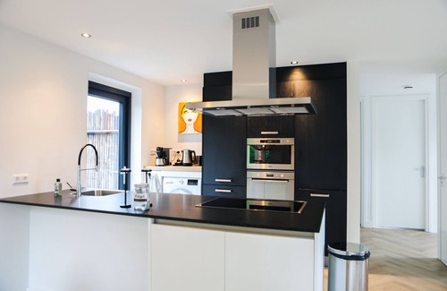Baarland House | Stijlvol Ingerichte Bungalow in Baarland