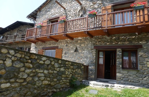 Besse House | Stone house with terrace in typical mountain village on GR 54
