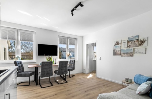 Gelting Apartment | Strandleben - upper floor, bathroom with shower, TV, parking space, terrace, barbecue, garden furniture,
