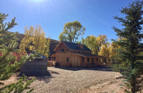 Fruitland Cabin | Strawberry Pinnicals cabin backing to the river located on 14 acres
